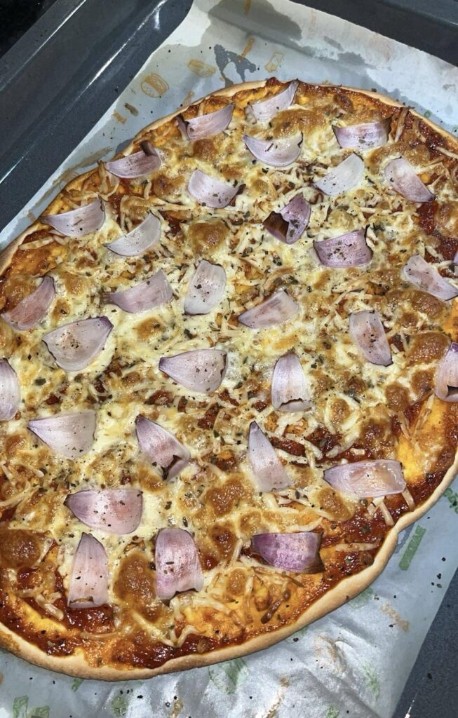 Tried baking a big pizza today. Rate my attempt 😋