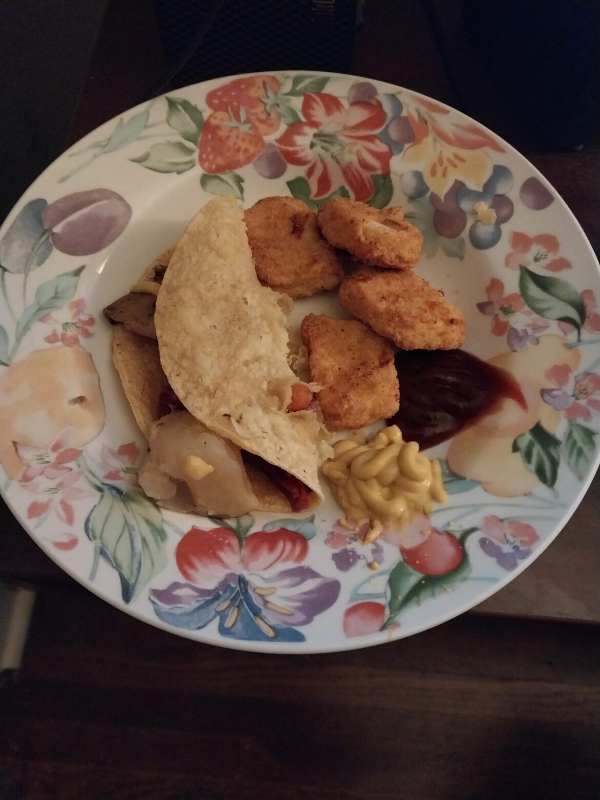 4 nuggets and a corned beef and potato taco