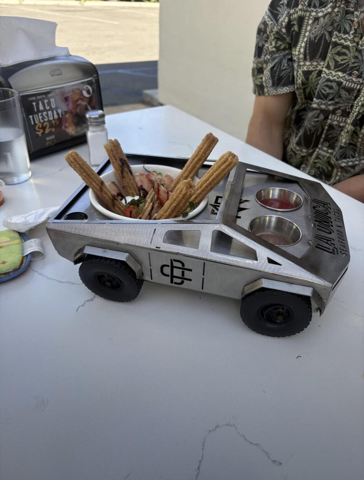 Serving churros out of a dumpster is wild hahah