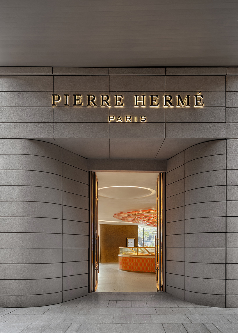 curved wood, rattan, and macaron displays frame a tropical french pâtisserie in singapore - 3