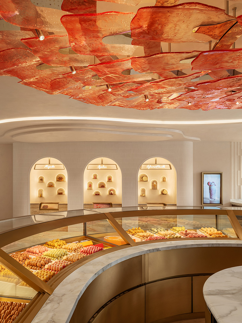 curved wood, rattan, and macaron displays frame a tropical french pâtisserie in singapore - 5