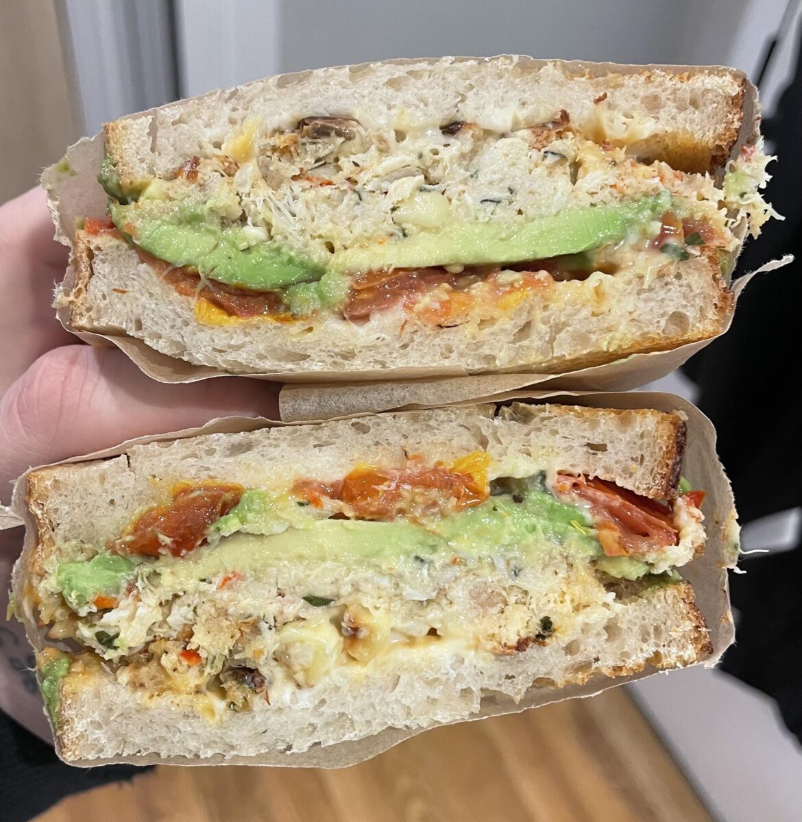 Leftover crab cakes with corn and red pepper, leftover roasted tomatoes, avocado, mayo, honey mustard