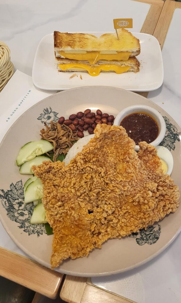 For today's breakfast, I ate Lava Salted Egg Butter Toast, Fried Pork Chop with Coconut Rice, Sweet Sauce Rice Noodle Rolls, Iced Coffee, and Pork Mince Dry Noodle