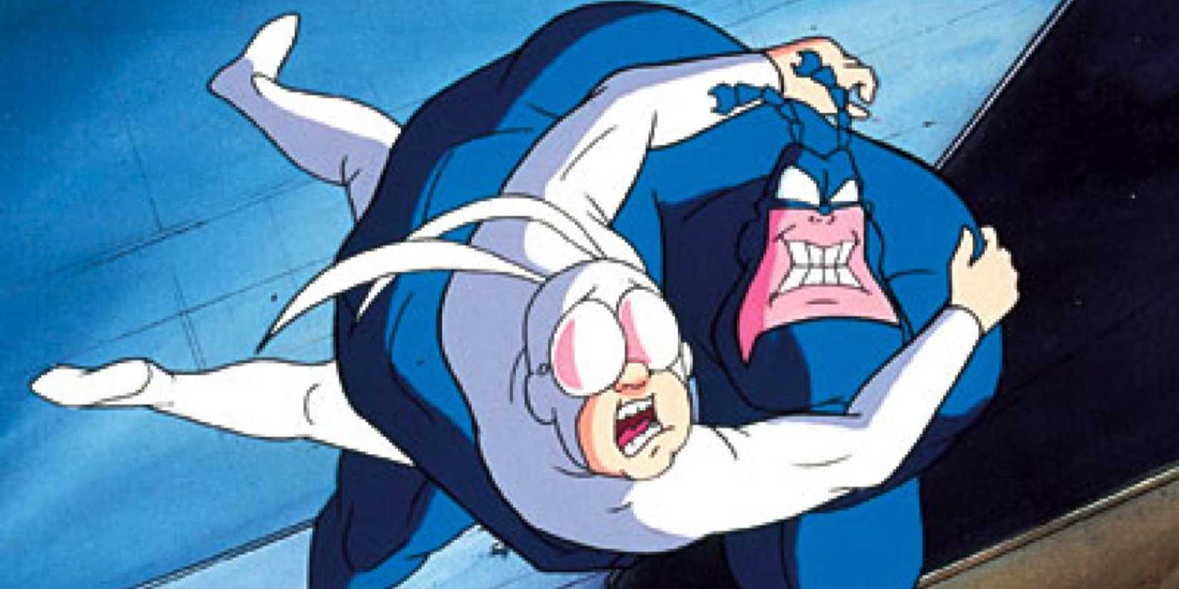 The Tick holding Arthur mid-jump