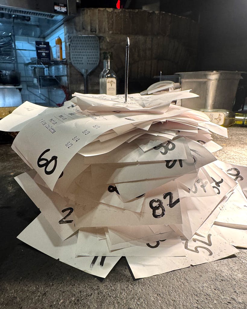 Order receipts from the last night of service at Vespaio