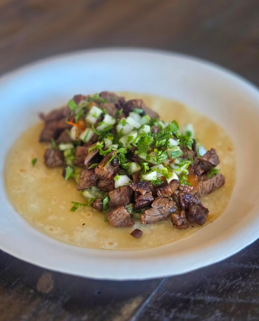 Carne Asada with guacamole on flour tortilla