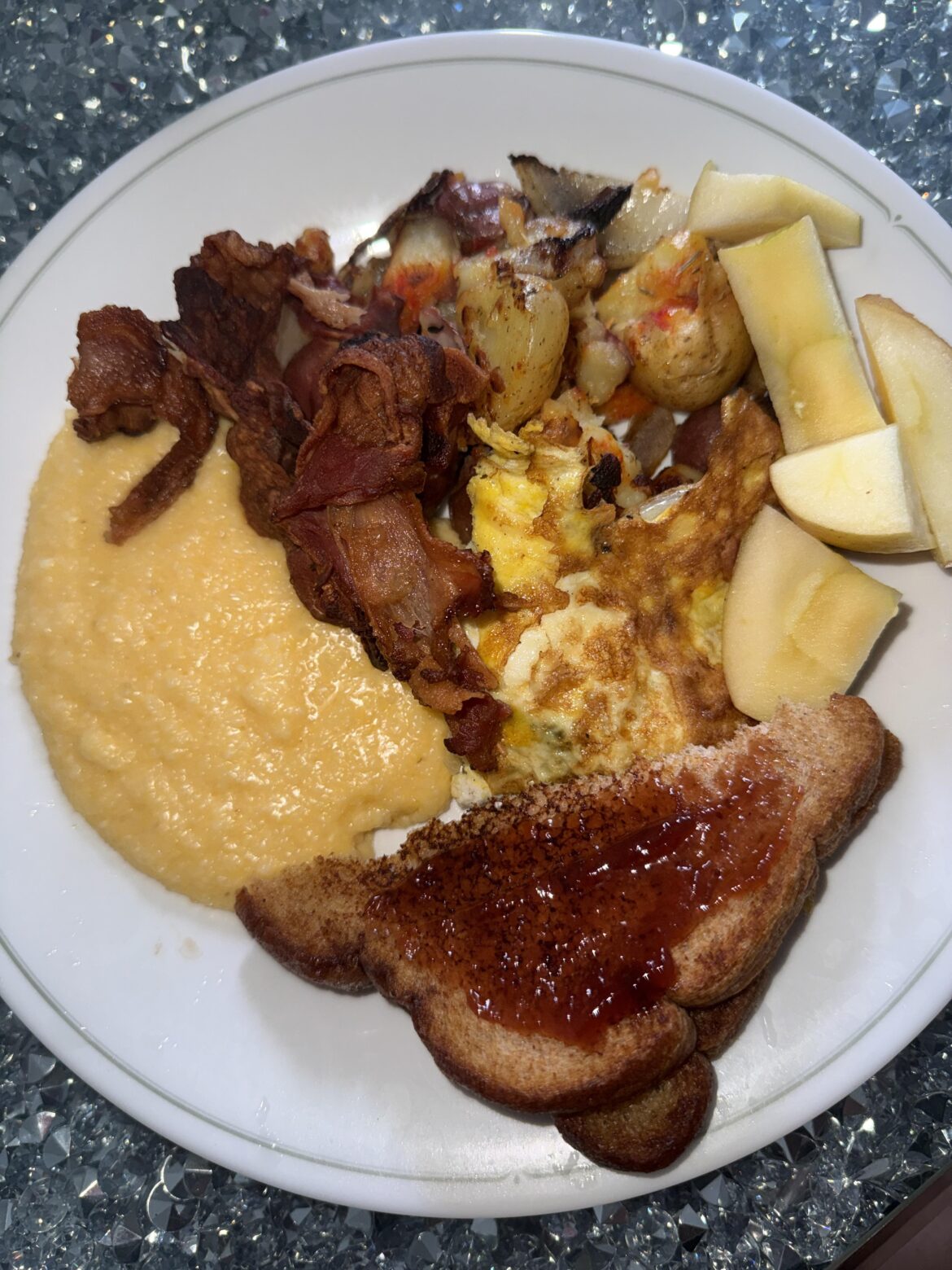 Grits bacon eggs potatoes apples