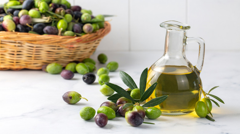 Olives and olive oil container