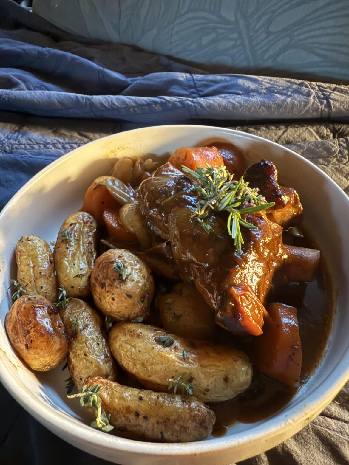 Lamb shank with herb and garlic roasted kipfler potatoes
