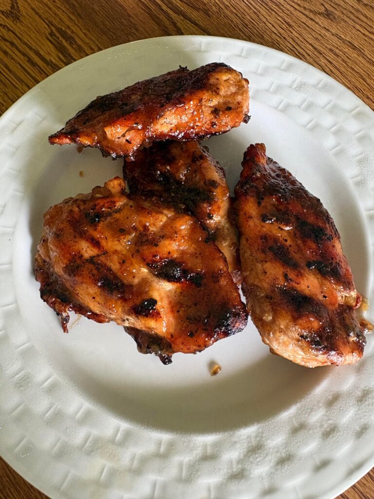 Grilled chicken breast with apple bacon barbecue sauce