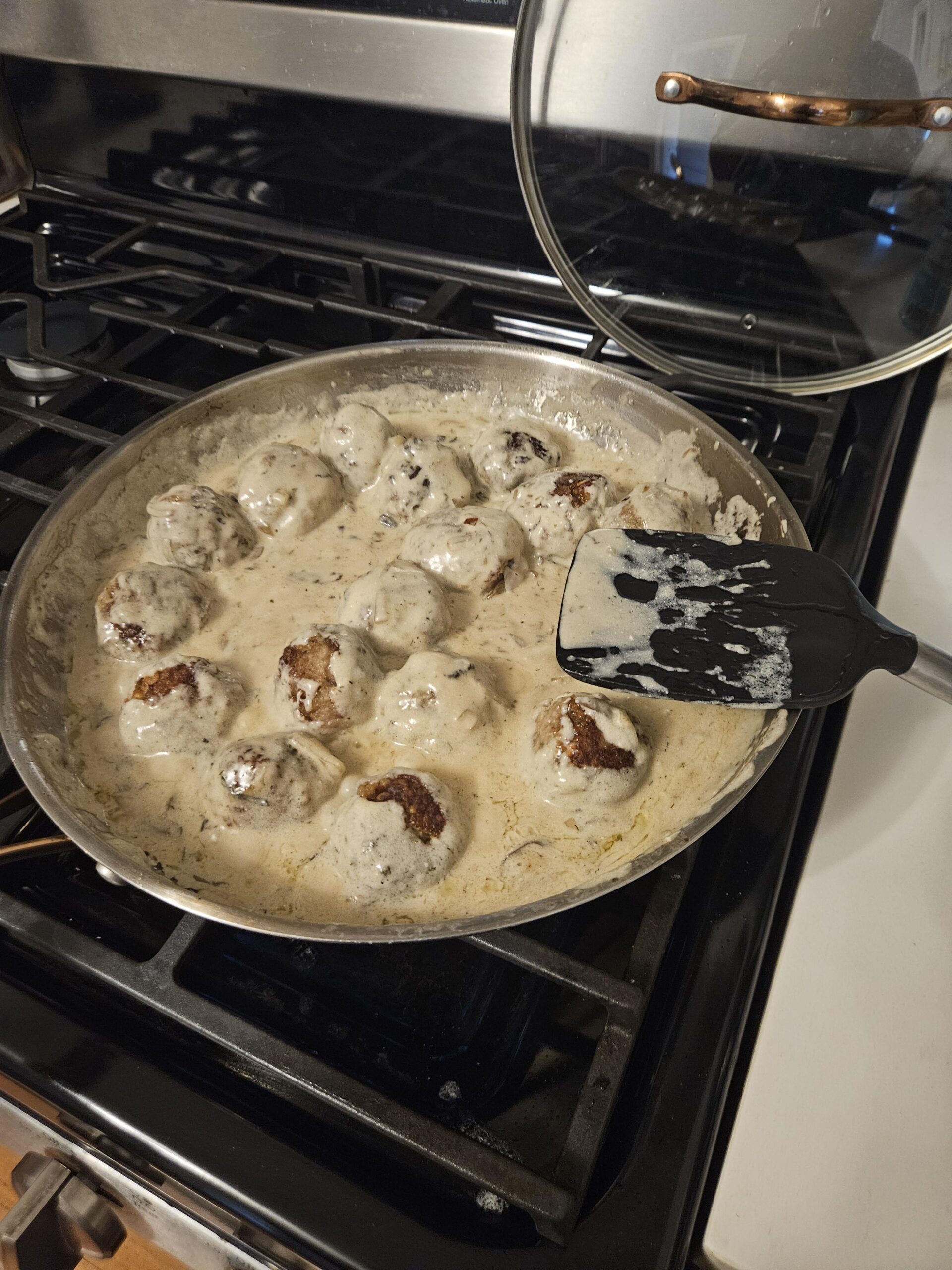My dog had tongo to sleep. Making meatballs in white sauce to eat with ...