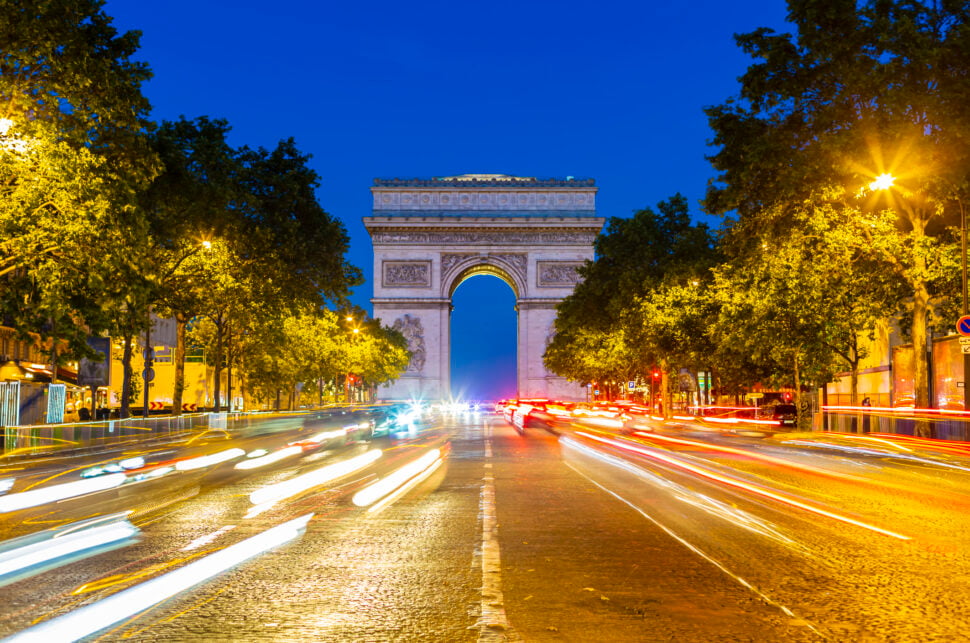 Arc de Triomphe in Paris at sunset.