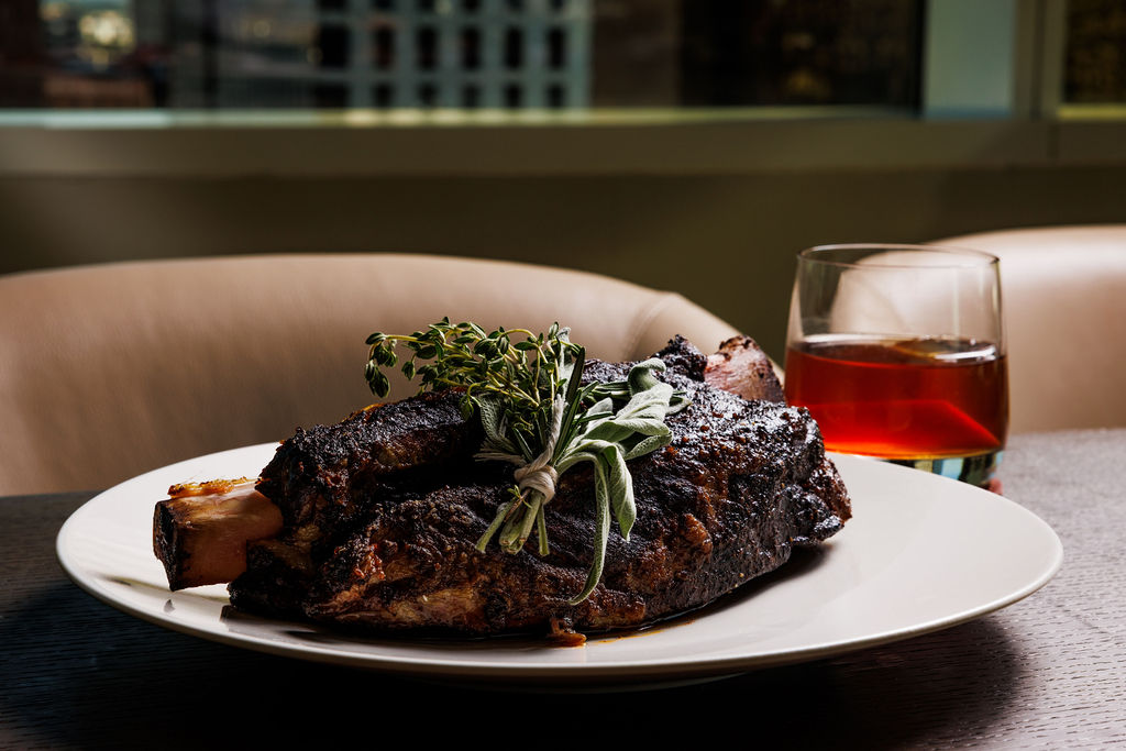 Modern Luxury - Sponsored Content - JW Steakhouse - Steak with Cocktail