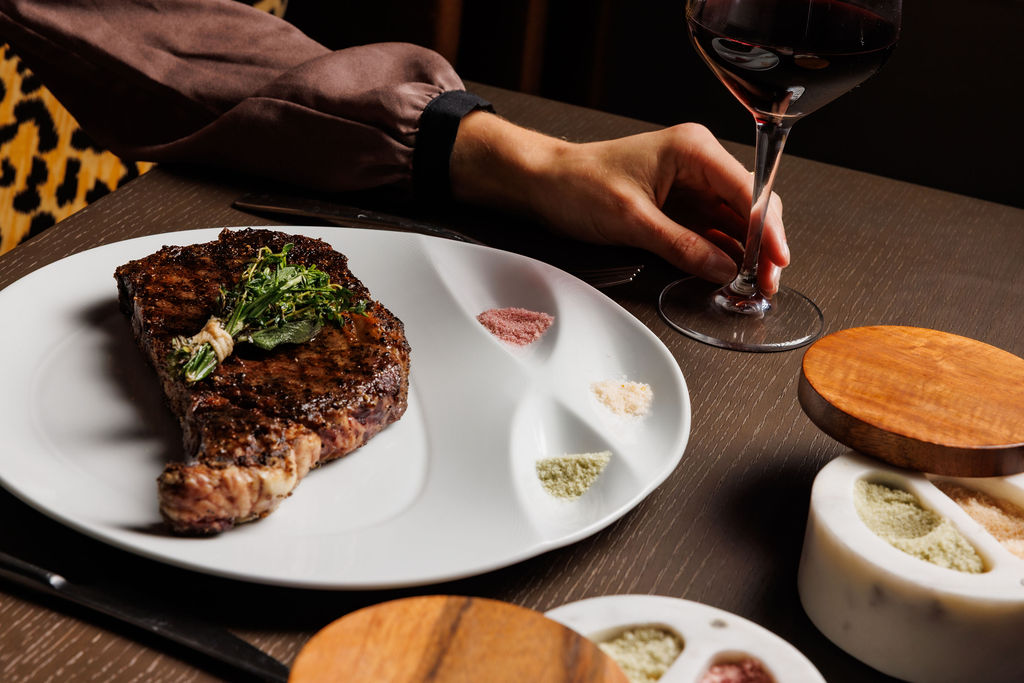 Modern Luxury - Sponsored Content - JW Steakhouse - Steak with Salt Service