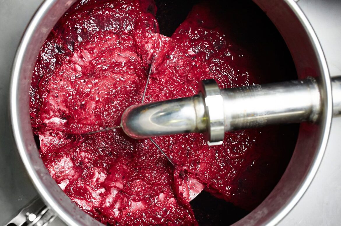 Vandal spills 60,000 litres of wine at Spanish winery – report red wine tank