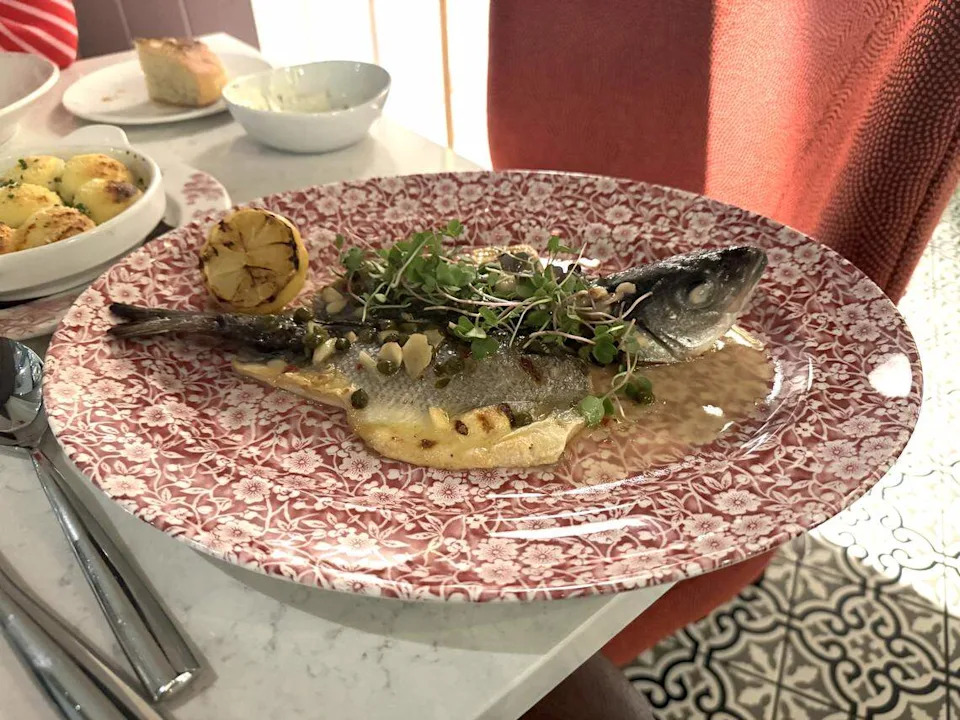 The Picatta at Italo: grilled spatchcooked mediterranean branzino, capers, lemon and garlic.