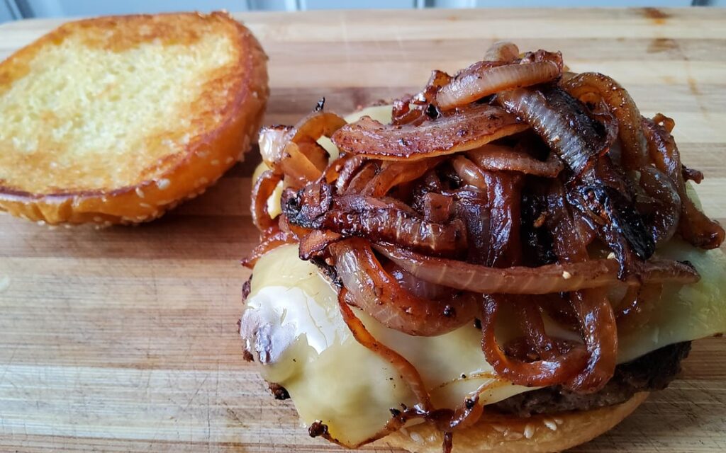 Cheeseburger with caramelized onions.