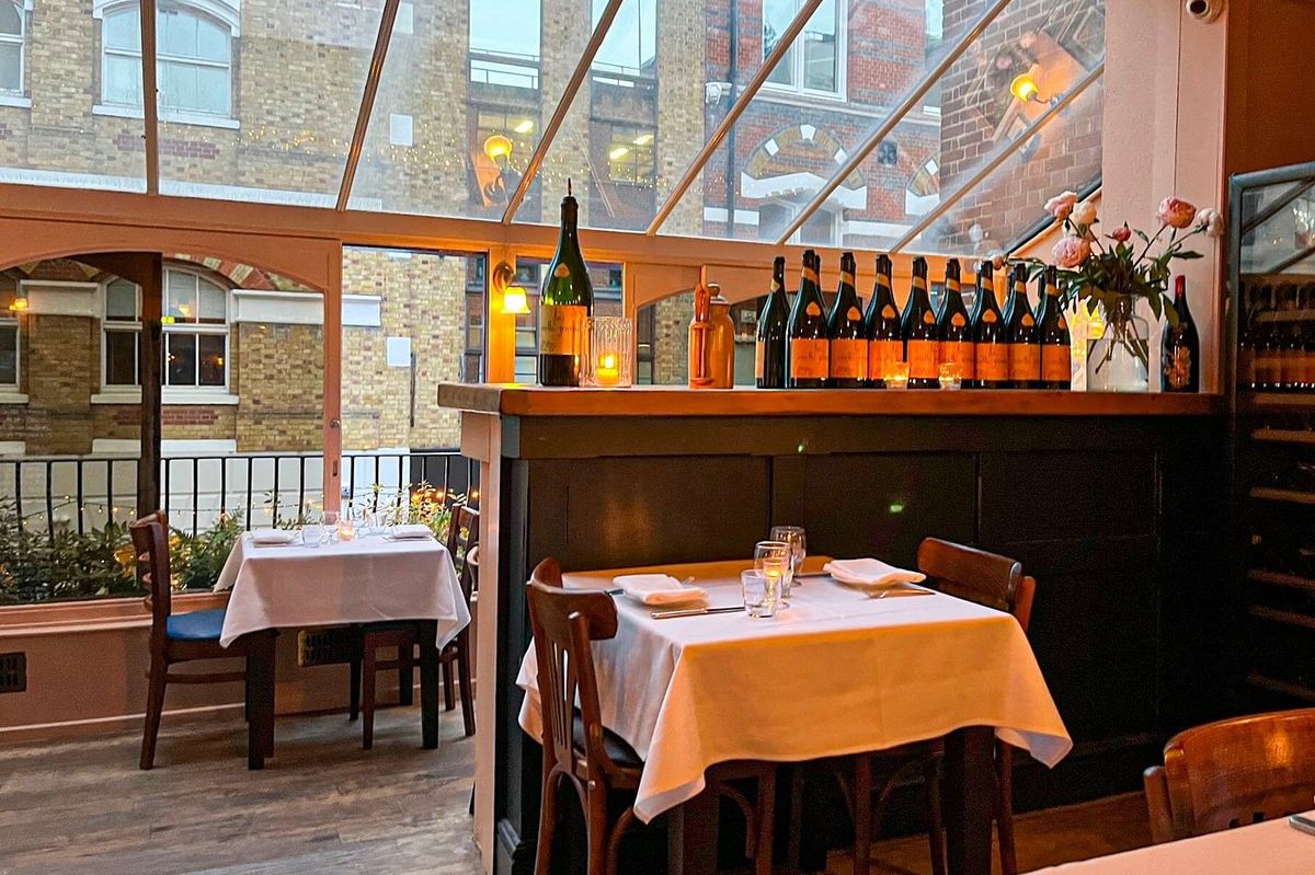 Bouchon Racine is located upstairs of the Three Compasses pub in Farringdon