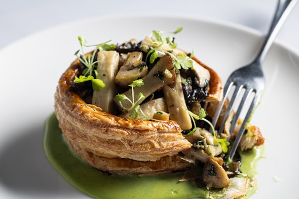 Mixed mushroom vol-au-vent with parsley coulis.