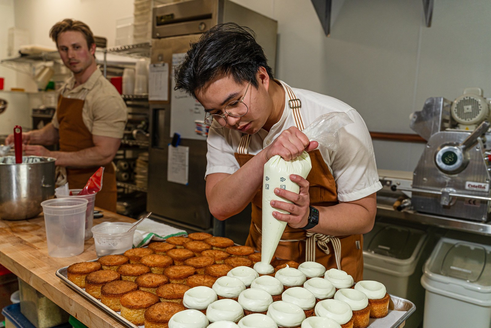 Del Sur’s Justin Lerias with a pastry bag.