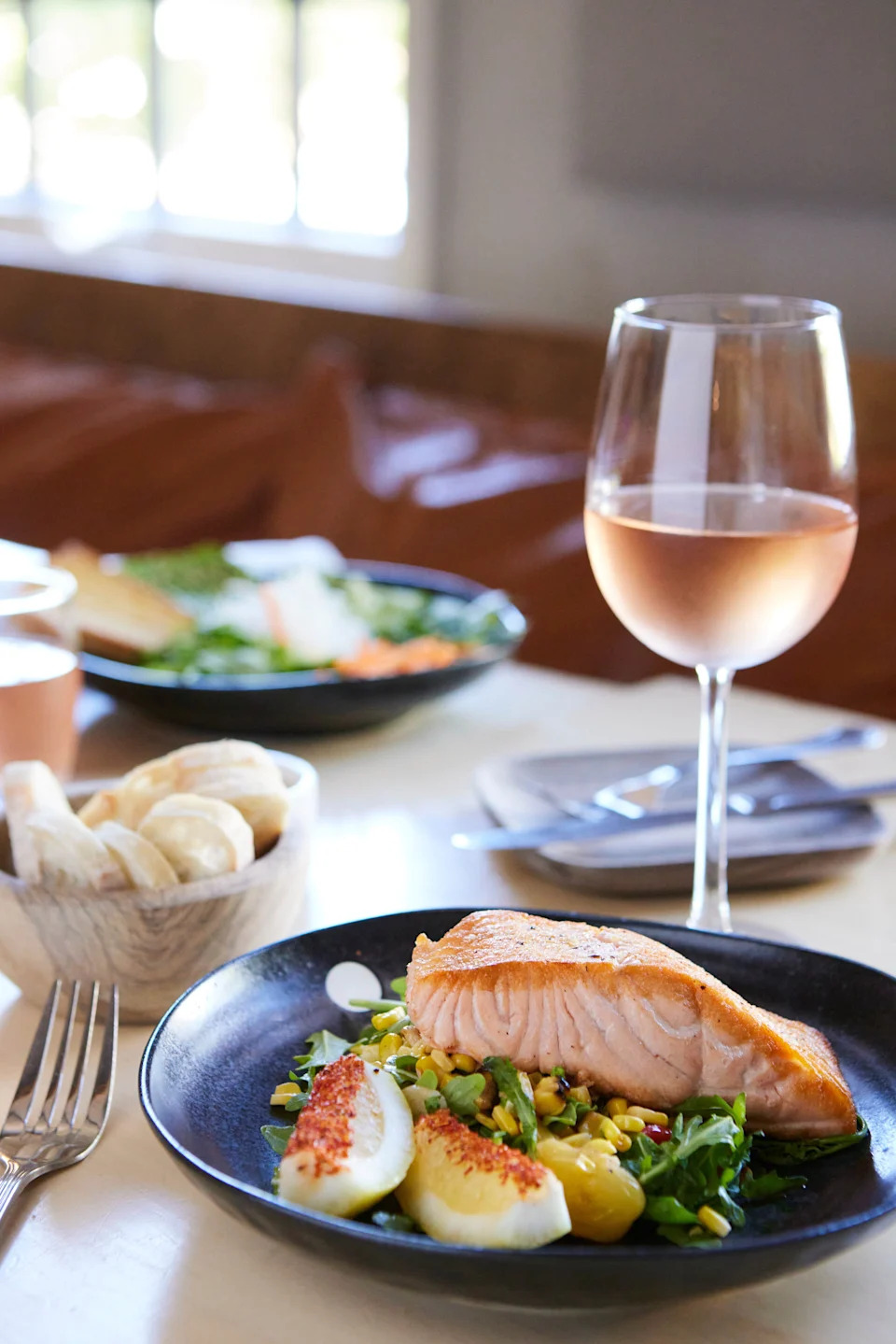 Nômade in Boca Raton's miso salmon with house-branded rosé.