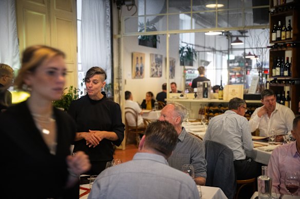 Trattoria Emilia's bustling dining room.