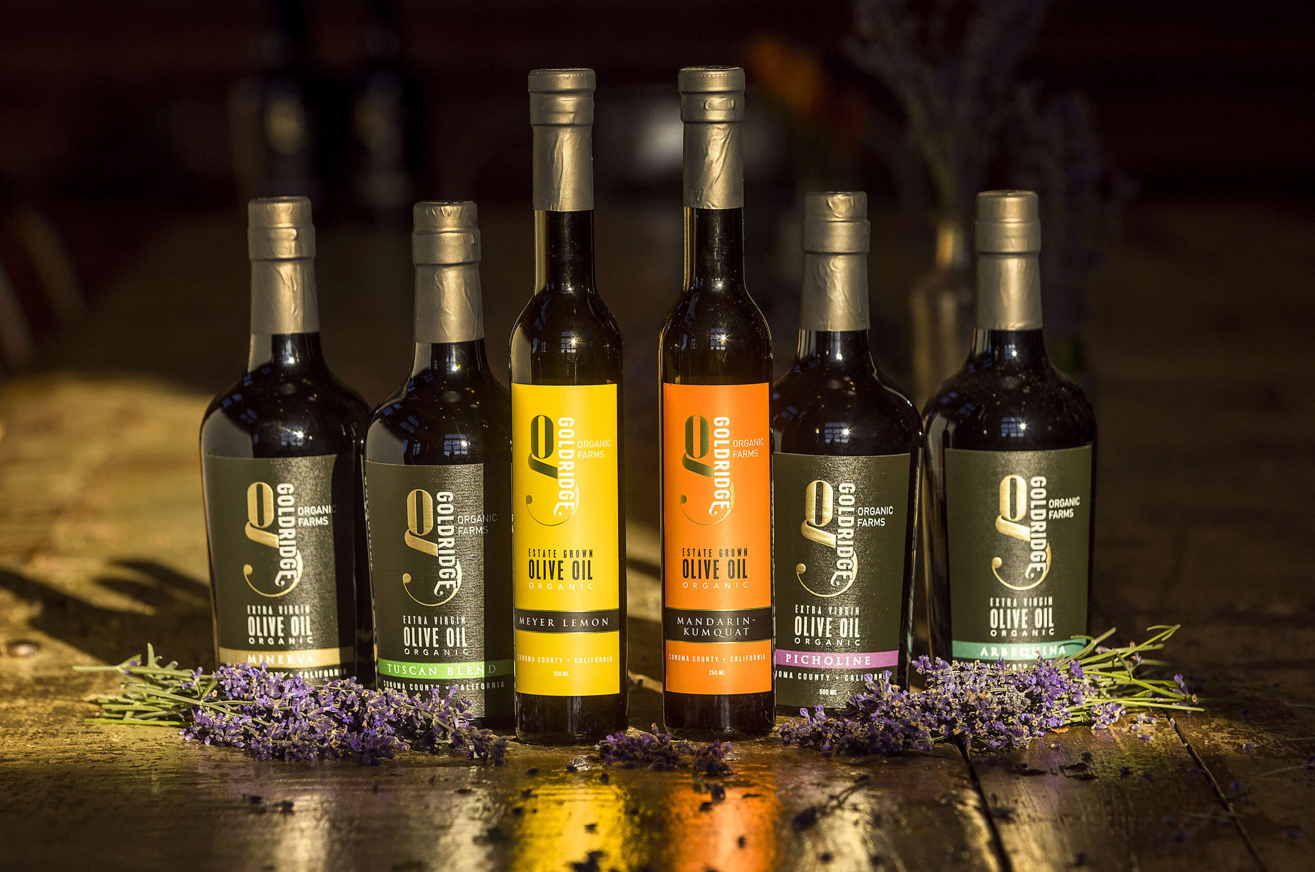 Brooke Hazen grows 70 acres of olives at Gold Ridge Organic Farms in west Sonoma County. New flavored varietals of Meyer Lemon and Mandarin-Kumquat, front have been added to traditional milled oils. Photo taken on Thursday, October 28, 2021. (John Burgess/The Press Democrat)