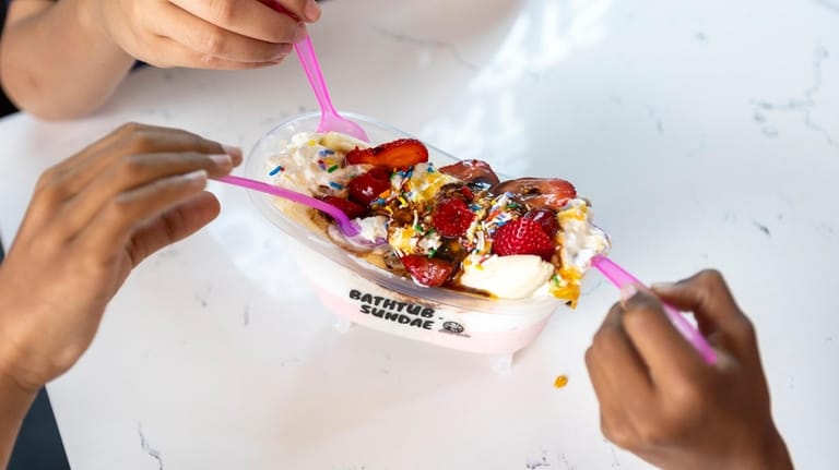 The Strawberry Banana Split Bathtub Sundae at Manny’s Sweet Treats.