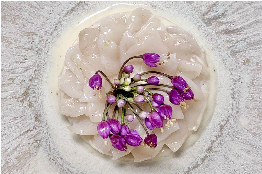 Chef Priyam’s Daab Chingri is a refined composition of mousse, poached prawns, granita and aromatic oil