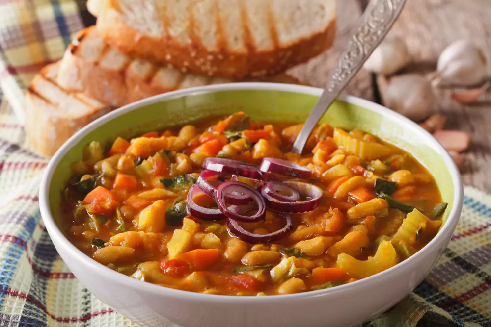 Ribollita soup made with stale bread, white beans and vegetables | Photo: Depositphotos