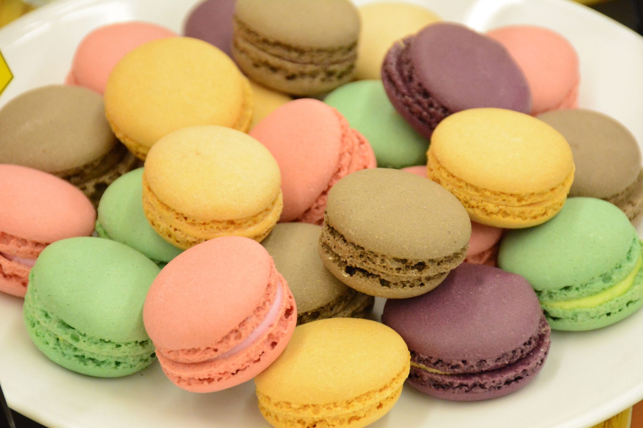 Macarons: These colourful sandwich cookies are made with almond flour and filled with buttercream, ganache or fruit jam. Light, crisp and chewy, macarons have become one of France's most famous desserts and are popular around the world. Macarons: These colourful sandwich cookies are made with almond flour and filled with buttercream, ganache or fruit jam. Light, crisp and chewy, macarons have become one of France's most famous desserts and are popular around the world.