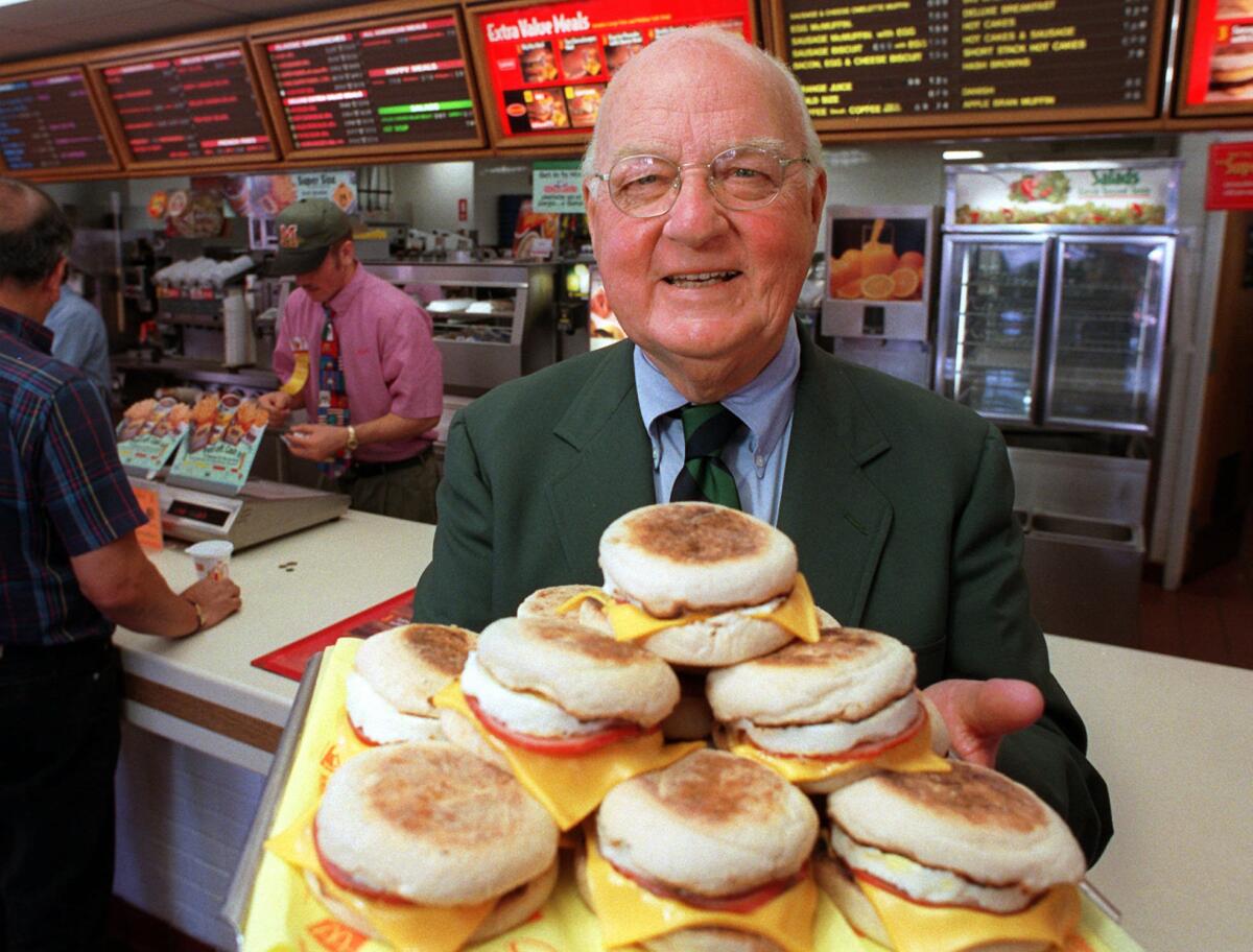 Herb Peterson holds a platter of Egg McMuffins