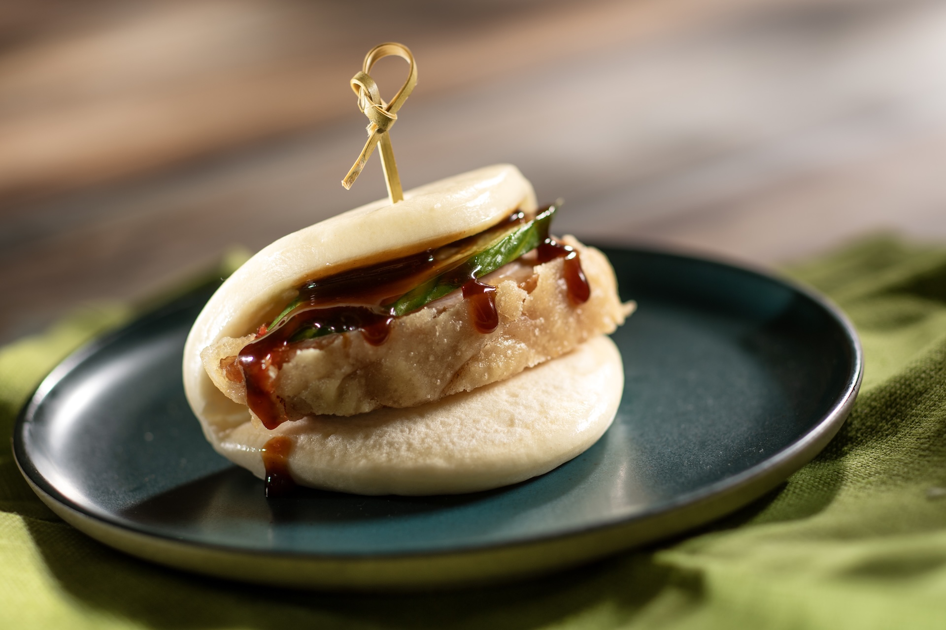 Smoked Duck Bao Bun with pickled cucumber, scallion, and hoisin sauce