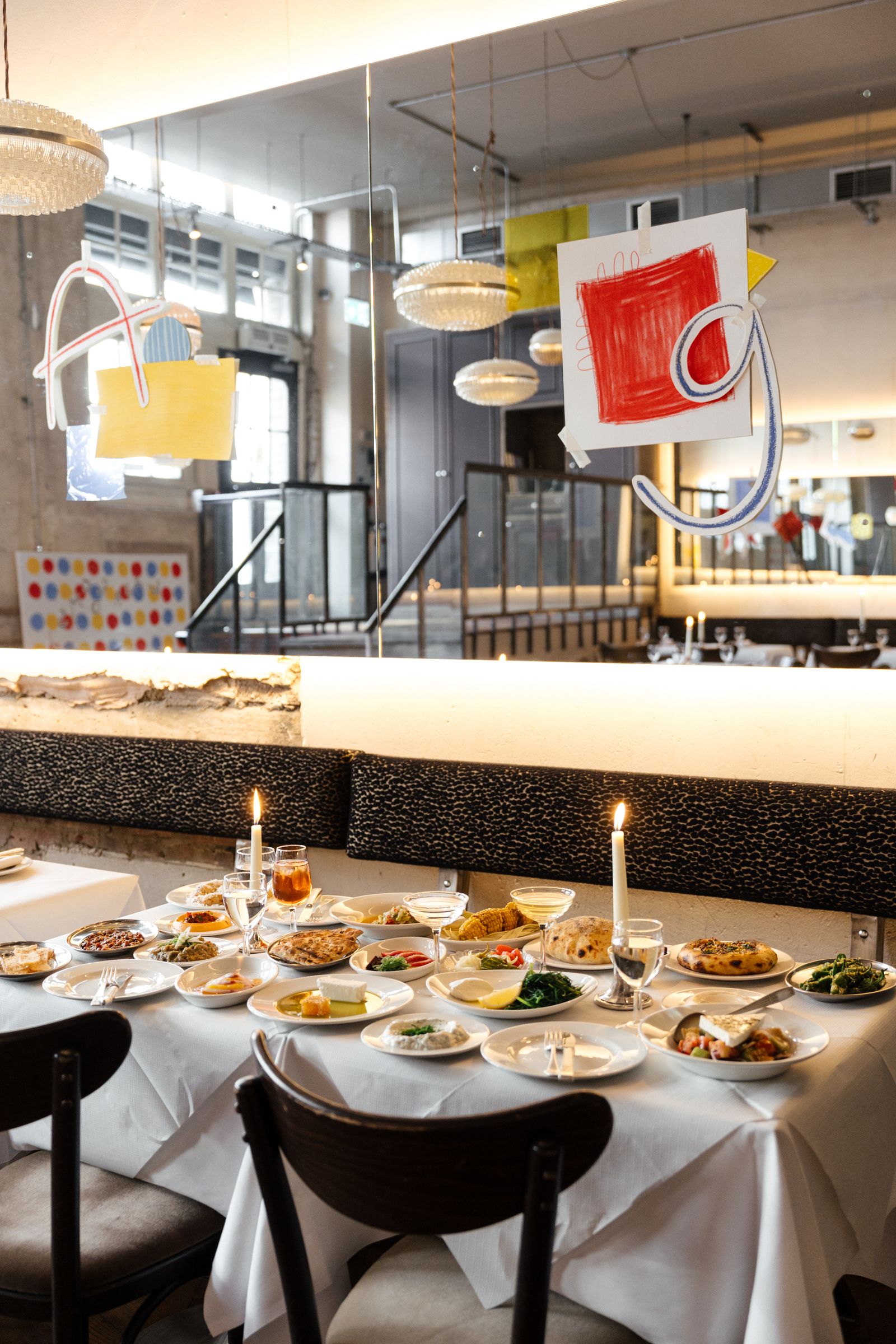 Image may contain Indoors Restaurant Cafeteria Dining Table Furniture Table Food Meal Brunch and Architecture