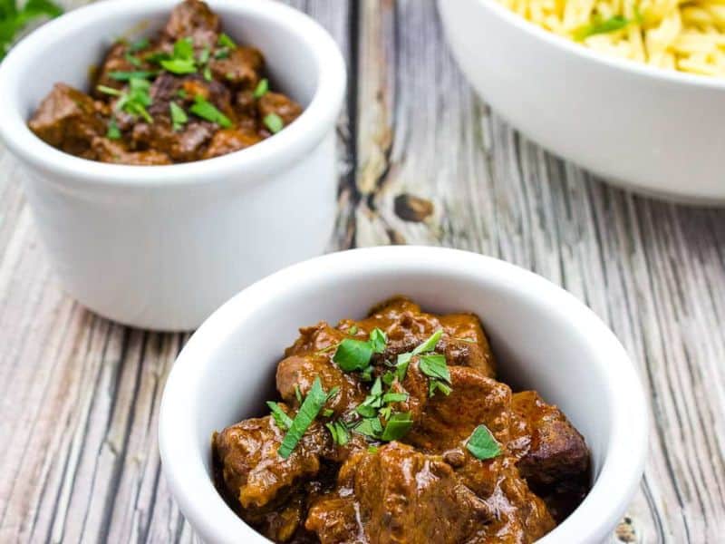 Hungarian Goulash in two white bowls.