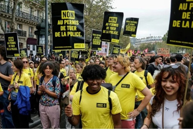 Thousands of French people take to the streets to protest the new security bill
