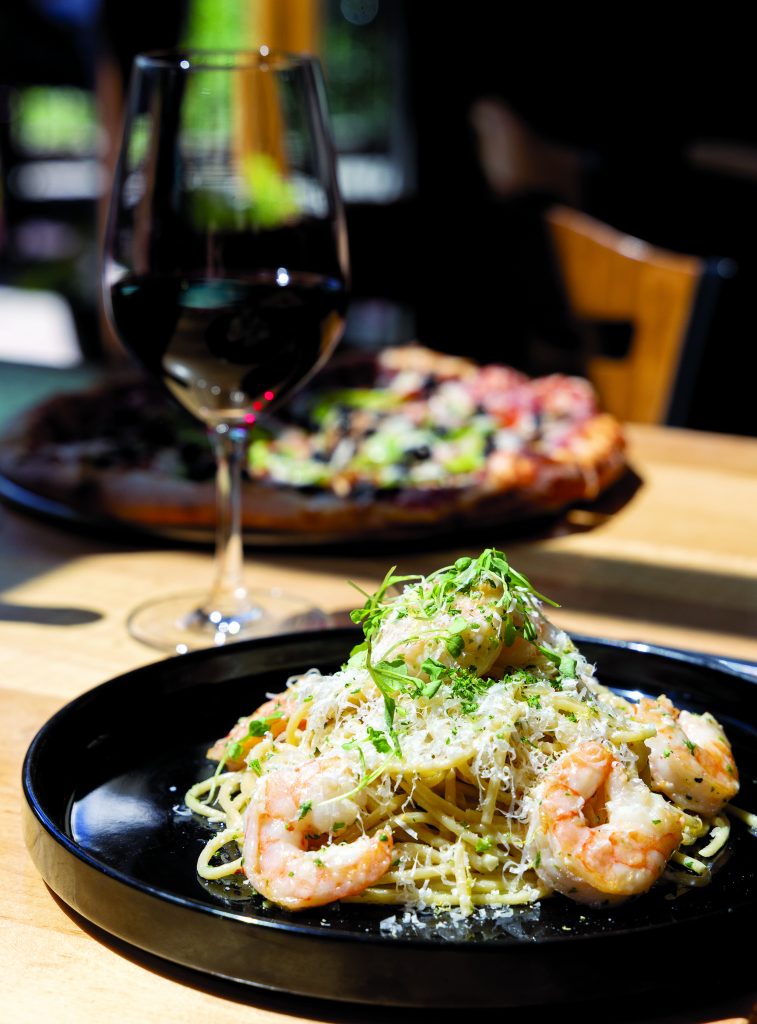Scampi spaghetti with shrimp, garlic, lemon, white wine, cream, chili flakes and parsley.