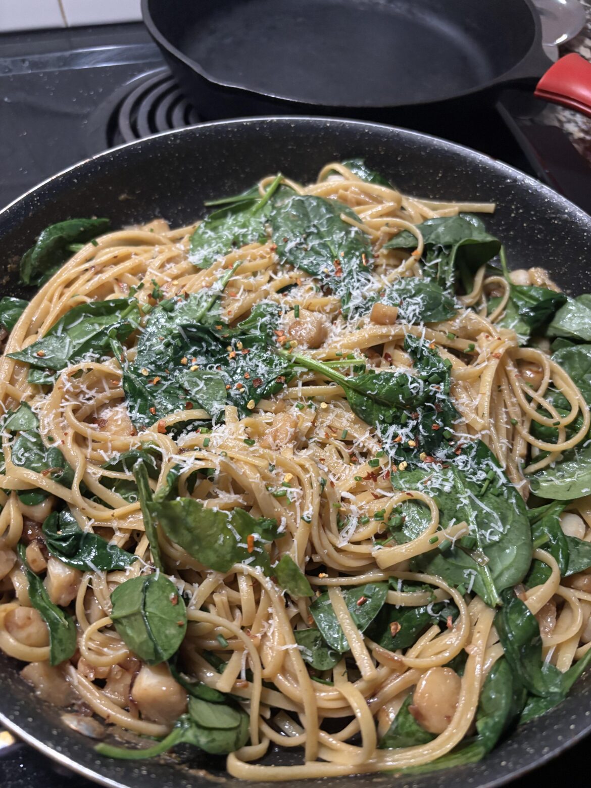 [OC] Seafood Pasta with pan sauce.