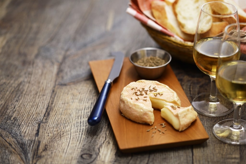 Traditional Munster washed-rind cheese with cumin seeds from Alsace