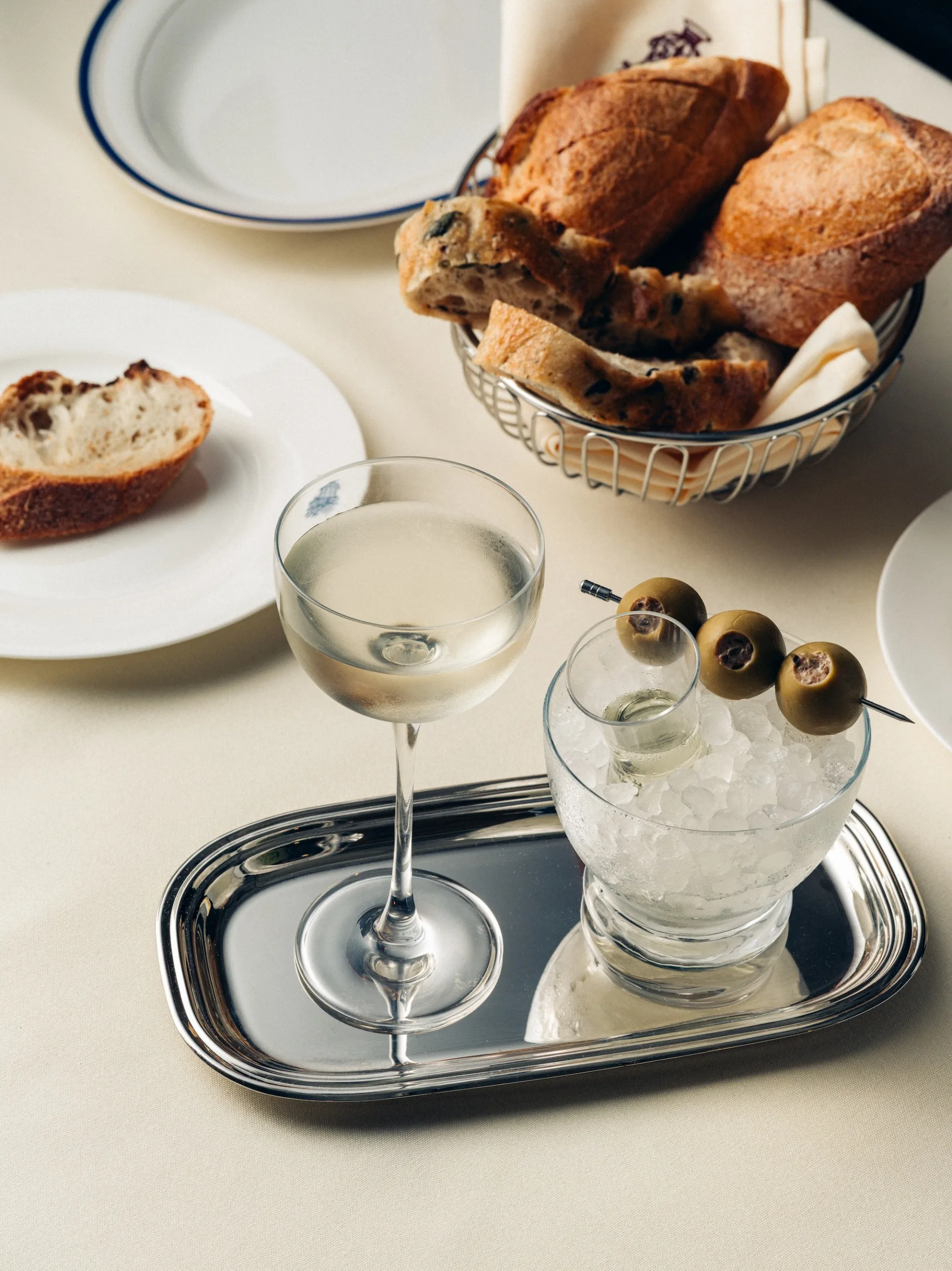 Classic martini elegantly served at Cafe Charmant New York with an olive.