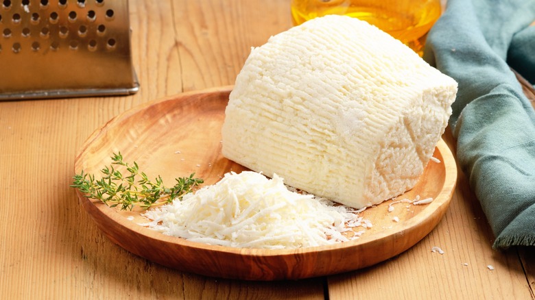 block of ricotta salata cheese on a plate